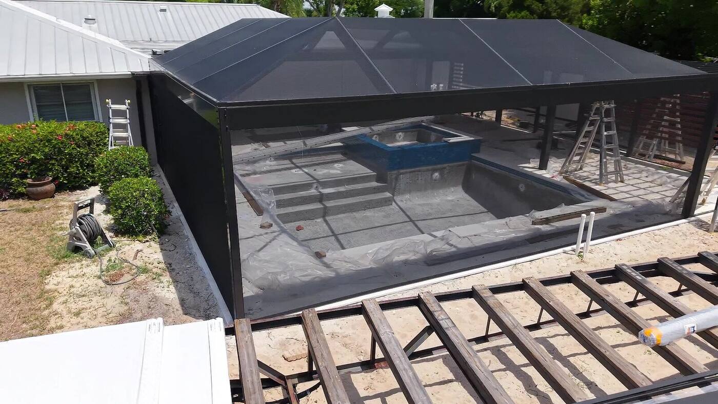 A mansard pool cage from above, before the deck is poured